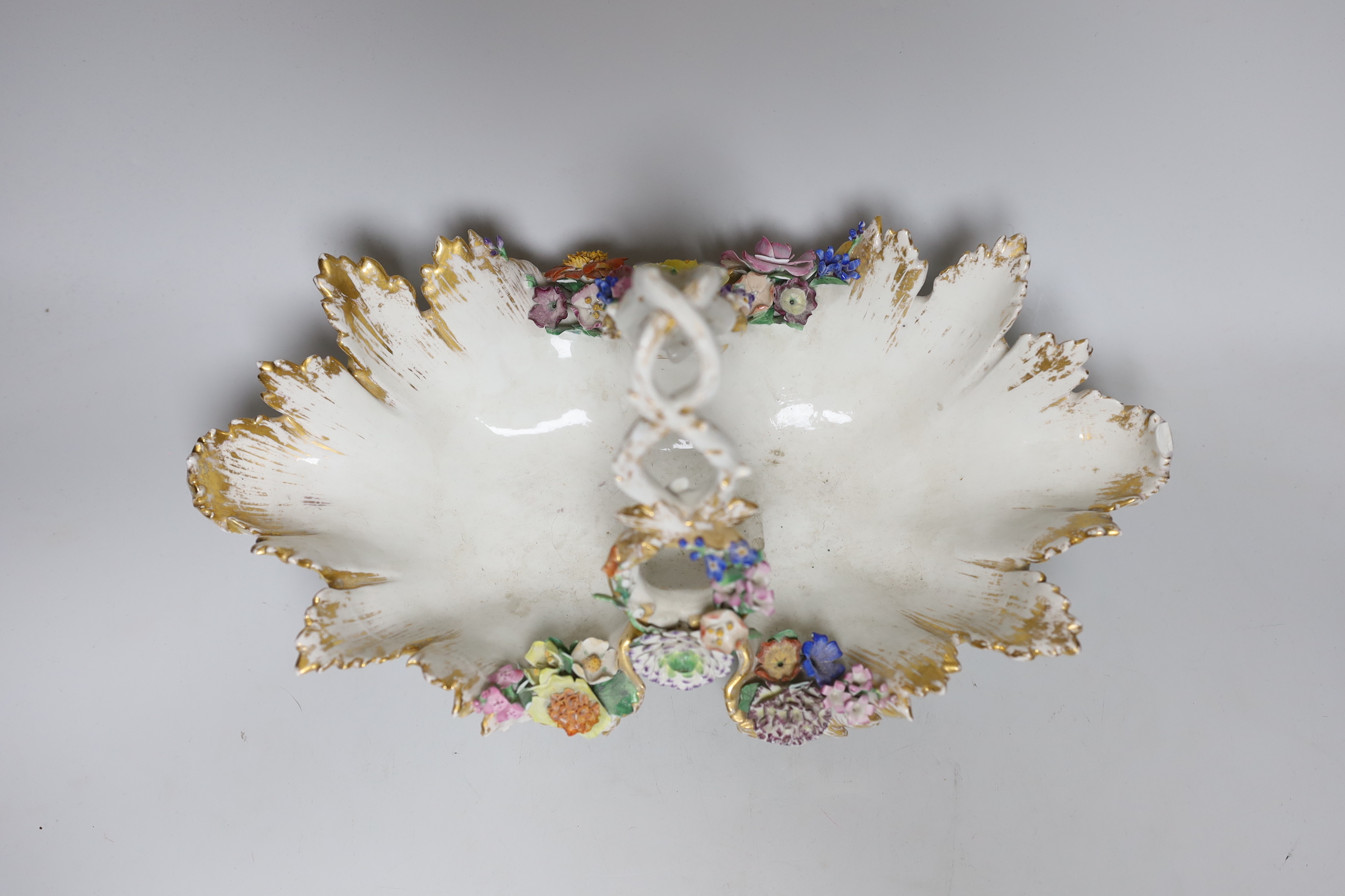 A large Meissen basket encrusted with flowers, 39cm long
